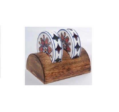 Wooden Napkin Holder with Two Ceramic Napkin Rings napkin holder with two decorative ceramic rings placed on a wooden base the rings have a floral pattern and are likely used to hold napkins in place #9146